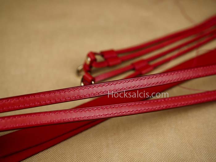 Red bag straps crafted to replace lv bag's worn out bag straps