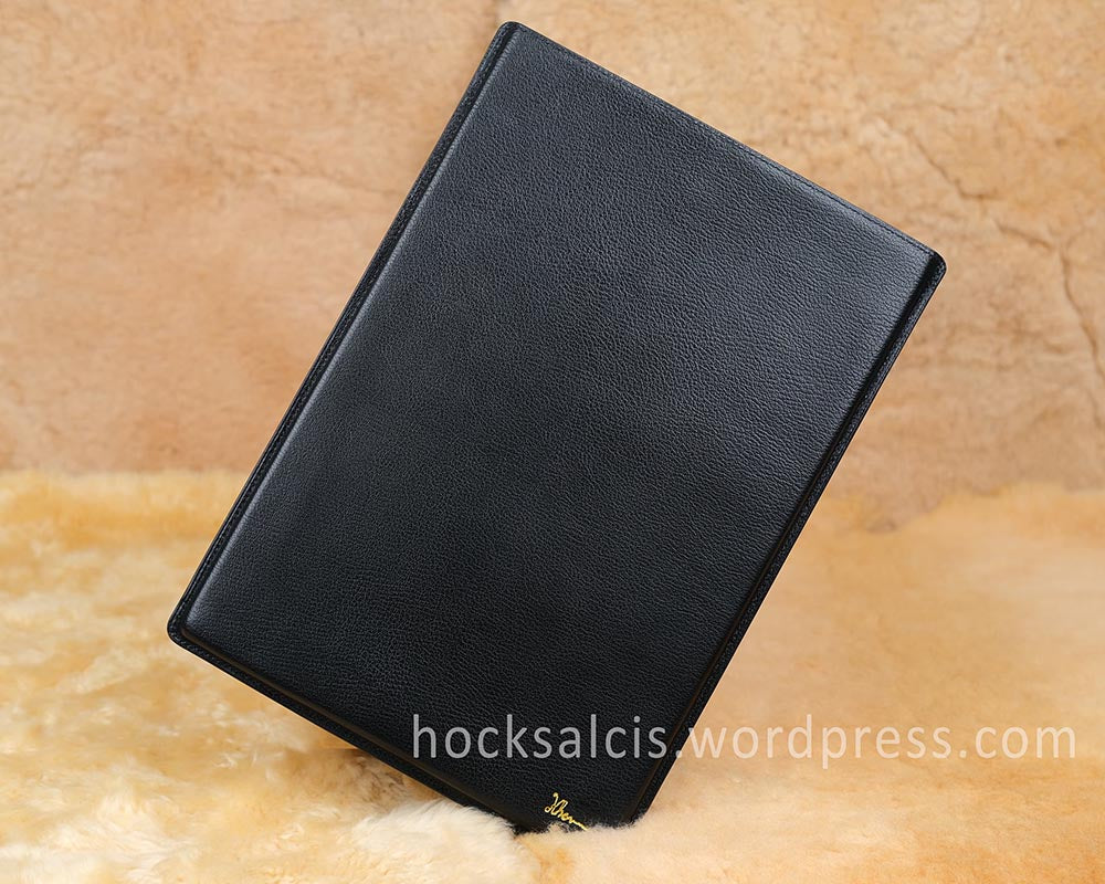 Custom black goat skin leather laptop sleeve personalised with gold foil printed name