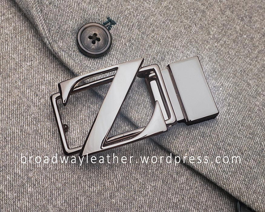 Freshly repaired Zegna belt buckle, polished and electroplated with Nickel.