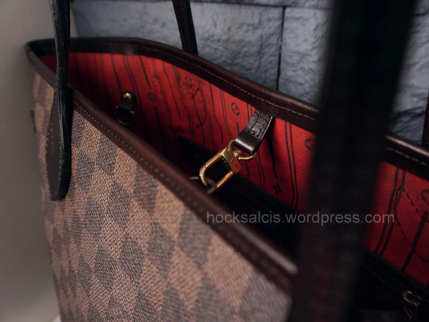 Straps of a preloved LV bag have been replaced with new ones.